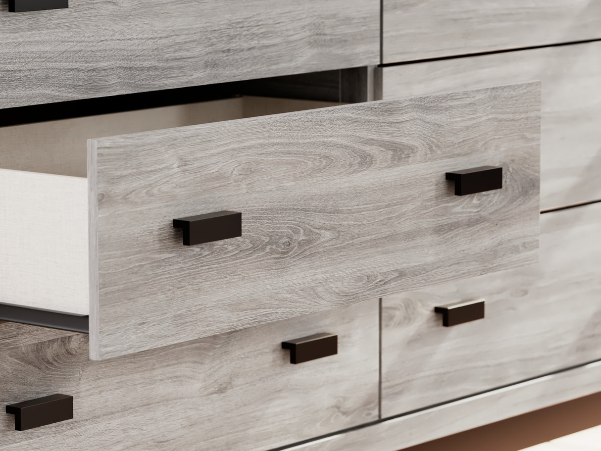 Vessalli Gray Queen Panel Bed, Dresser, Mirror And Nightstand