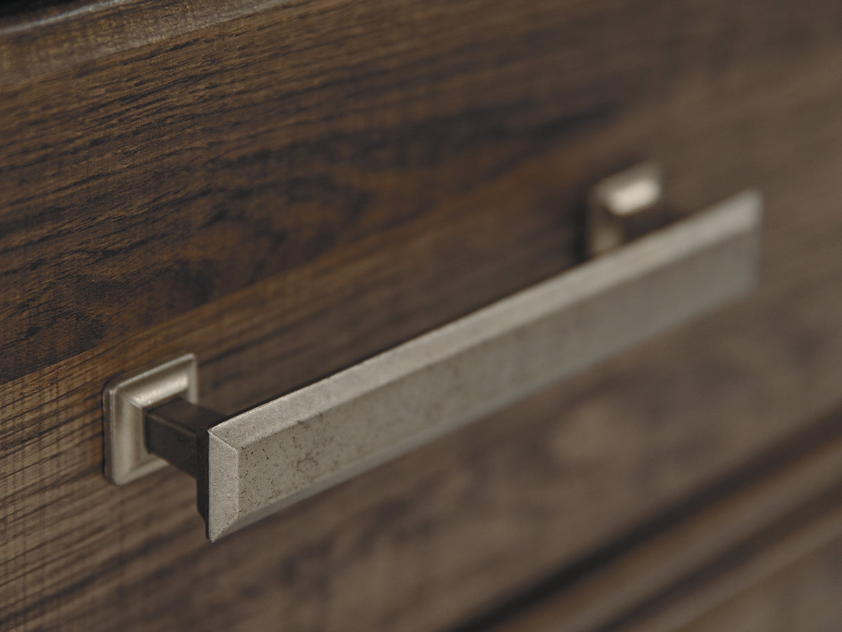 Juararo Dark Brown King Poster Bed, Dresser, Chest And Nightstand