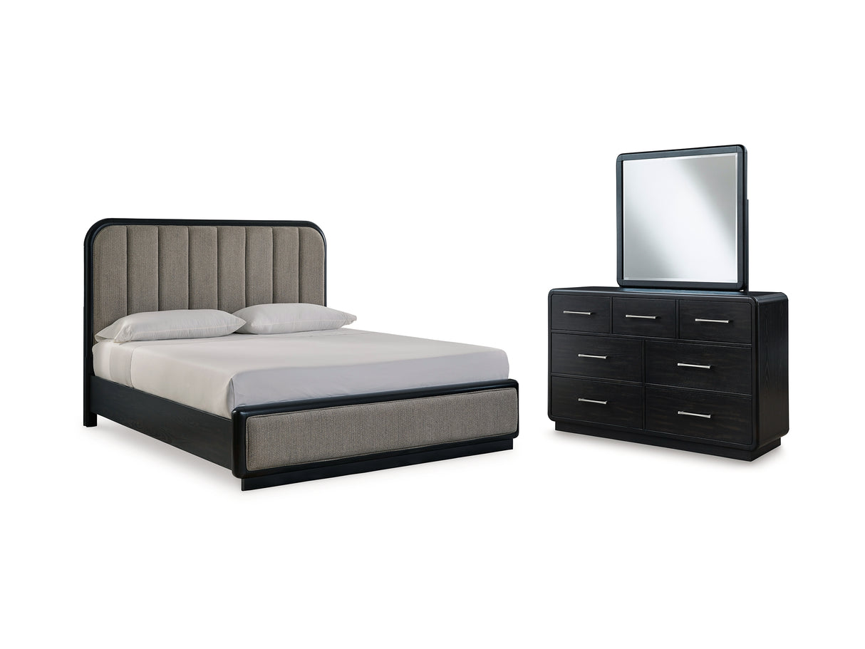 Rowanbeck Black California King Upholstered Panel Bed, Dresser And Mirror