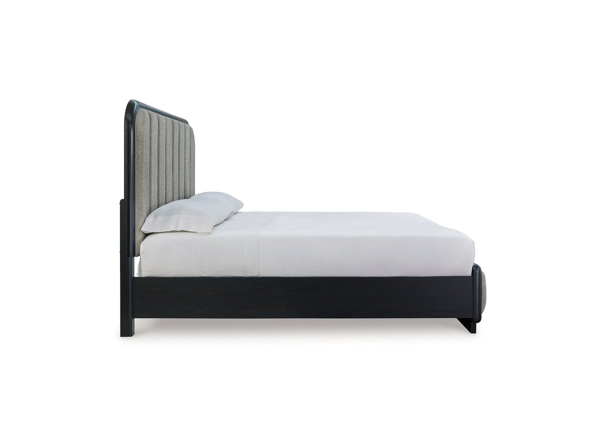Rowanbeck Black California King Upholstered Panel Bed, Dresser And Mirror