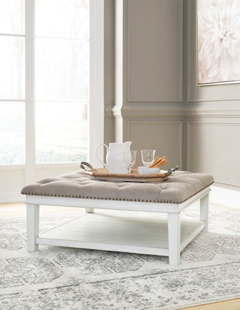 Kanwyn Whitewash Upholstered Ottoman Coffee Table