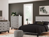 Vessalli Gray Queen Panel Bed, Dresser, Mirror And Nightstand