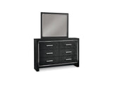 Kaydell Black Queen Upholstered Panel Bed, Dresser, Mirror, And Nightstand