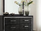 Kaydell Black Queen Upholstered Panel Bed, Dresser, Mirror, And Nightstand