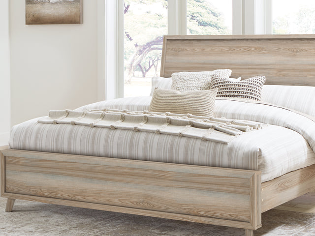 Hasbrick Tan King Panel Bed