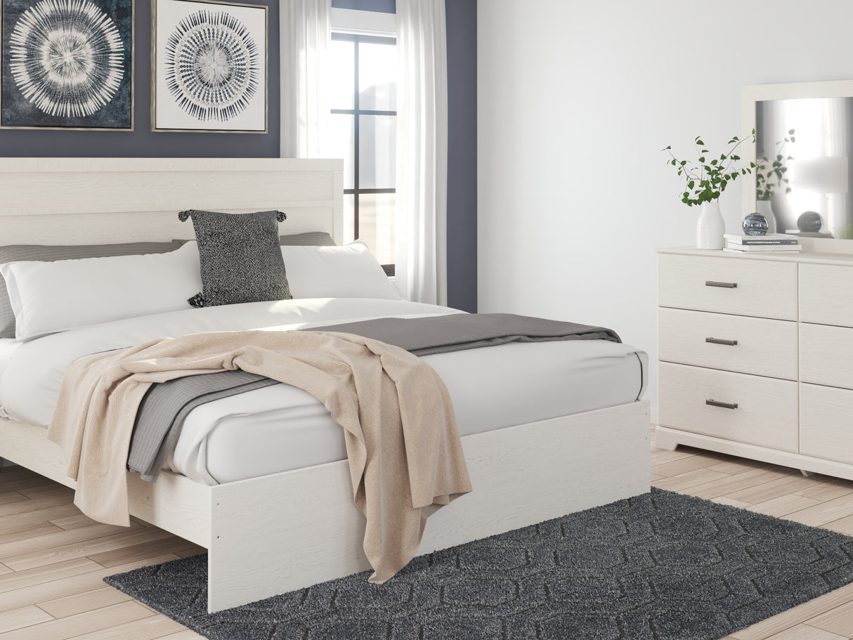 Stelsie White King Panel Bed With Dresser, Mirror And Nightstand