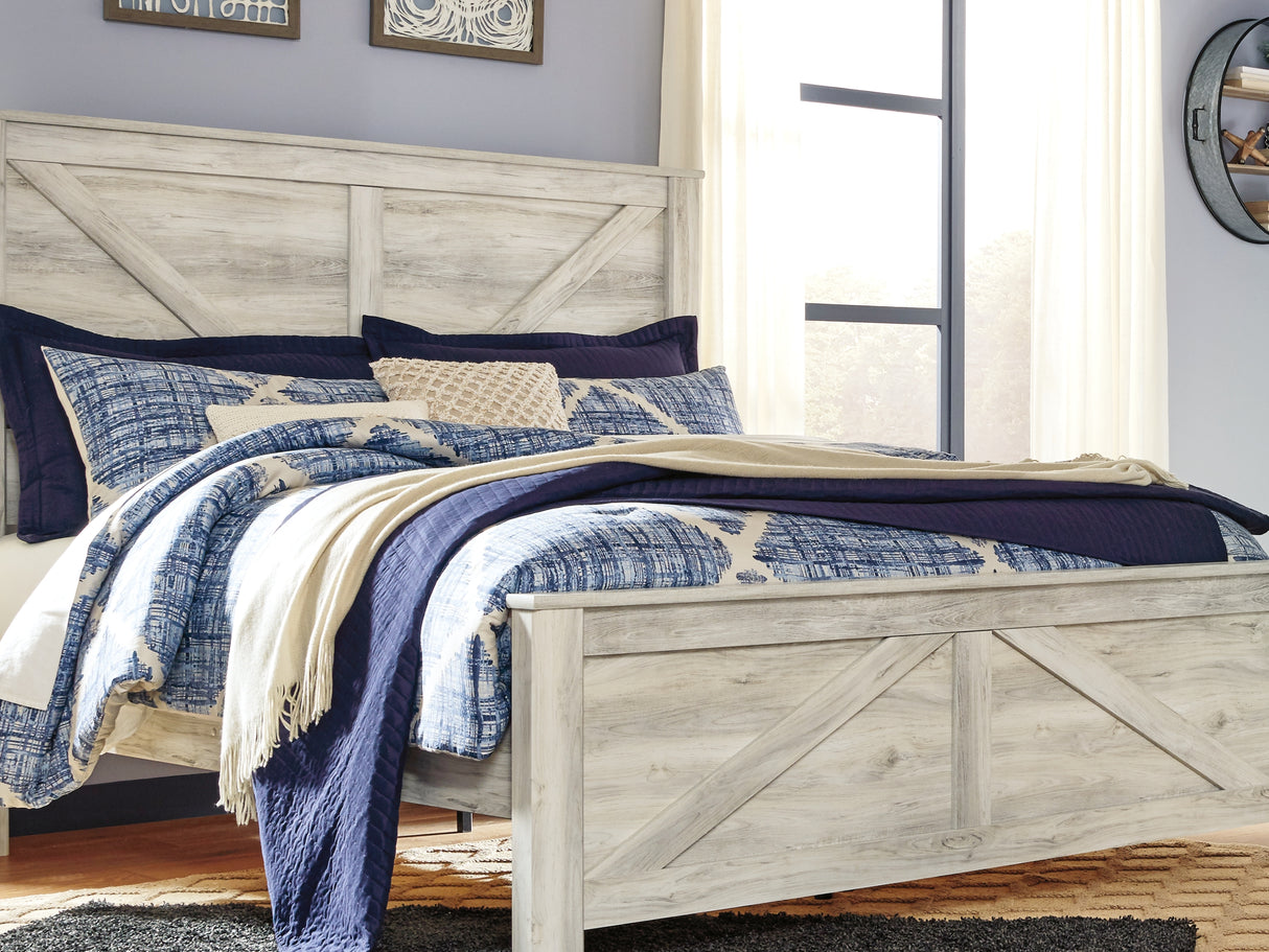 Bellaby Whitewash King Crossbuck Panel Bed, Dresser, Mirror, And Nightstand