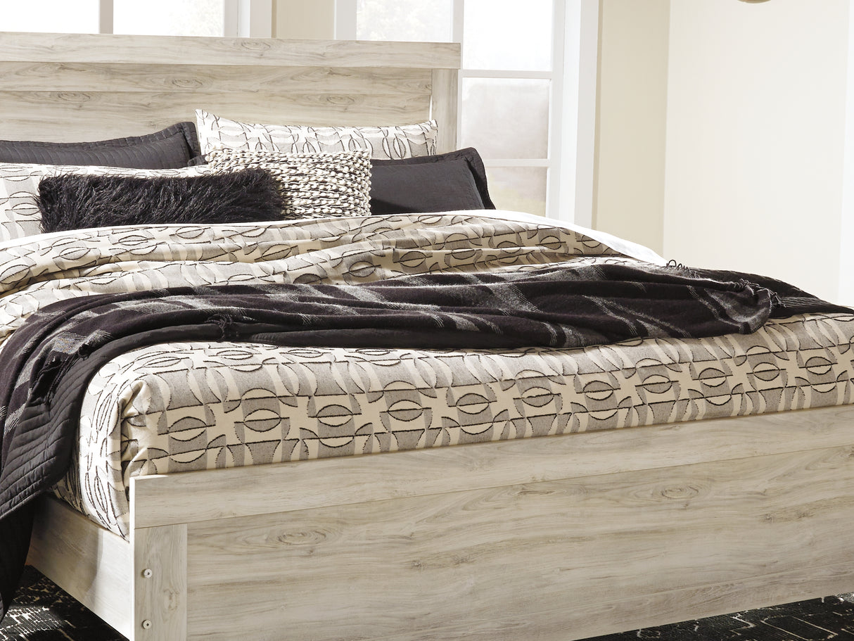 Bellaby Whitewash King Panel Bed, Dresser, Mirror And 2 Nightstands