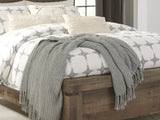 Trinell Brown Queen Panel Bed