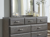 Caitbrook Gray King Storage Bed, Dresser, Mirror And 2 Nightstands