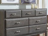 Caitbrook Gray King Storage Bed, Dresser And Nightstand
