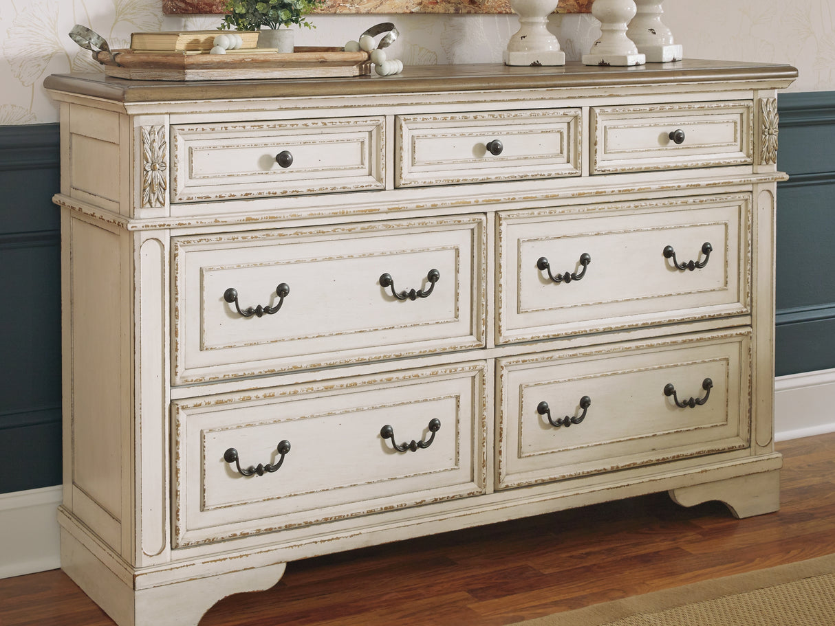 Realyn King Storage Bed, Dresser, Chest And 2 Nightstands