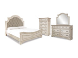 Realyn Chipped White King Panel Upholstered Bed, Dresser, Mirror And Chest