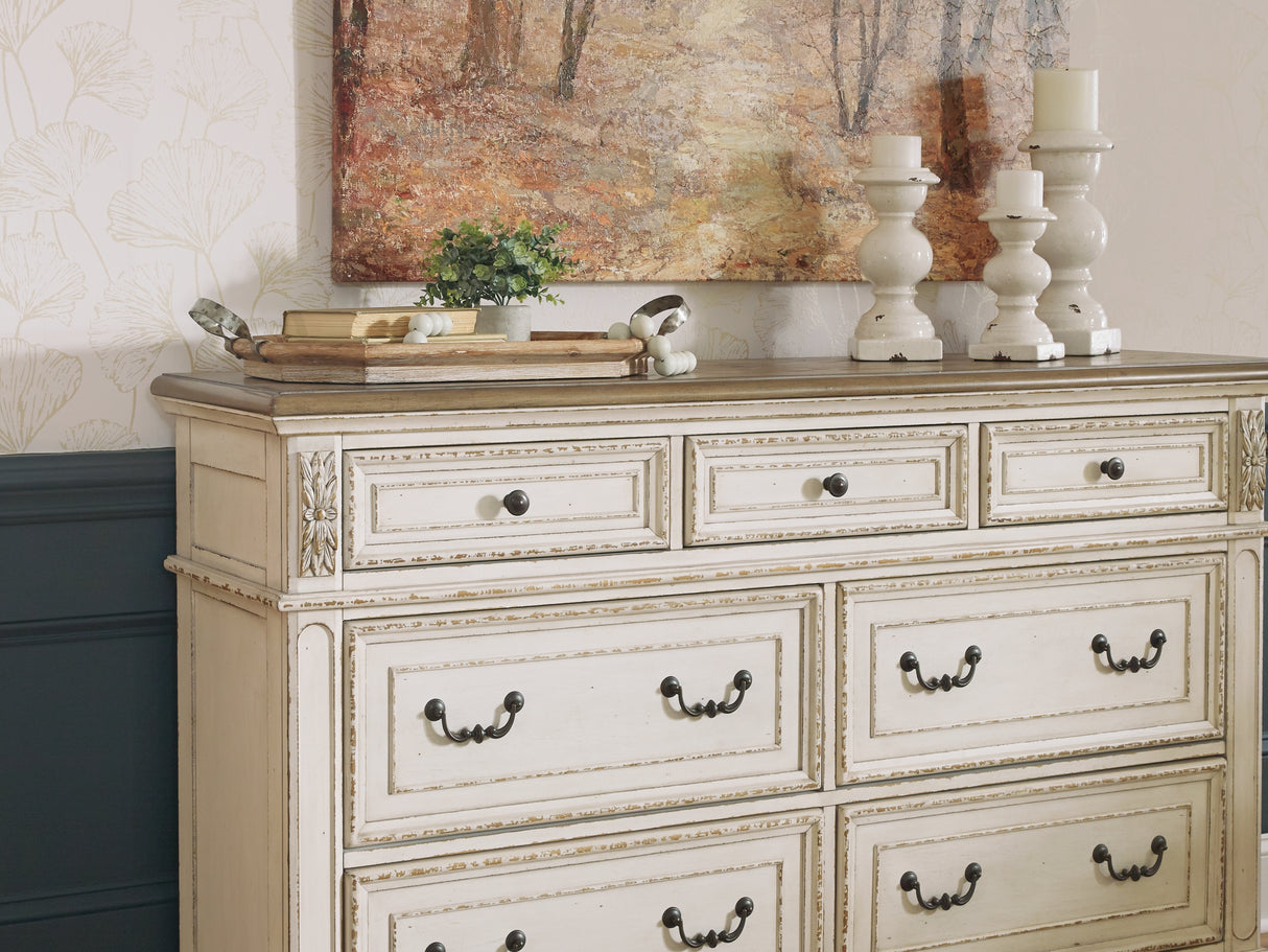 Realyn King Storage Bed, Dresser, Chest And 2 Nightstands