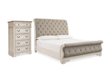 Realyn Two-Tone Queen Upholstered Sleigh Bed And Chest