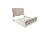 Realyn Two-Tone Queen Upholstered Sleigh Bed And Chest