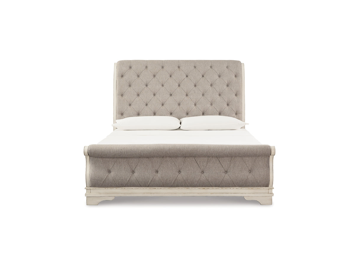 Realyn Two-Tone Queen Upholstered Sleigh Bed And Chest