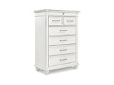 Kanwyn Whitewash King Upholstered Panel Bed, Dresser, Mirror And Chest