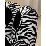 Paus Swivel Accent Chair