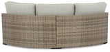 Calworth Beige Outdoor Curved Loveseat With Cushion